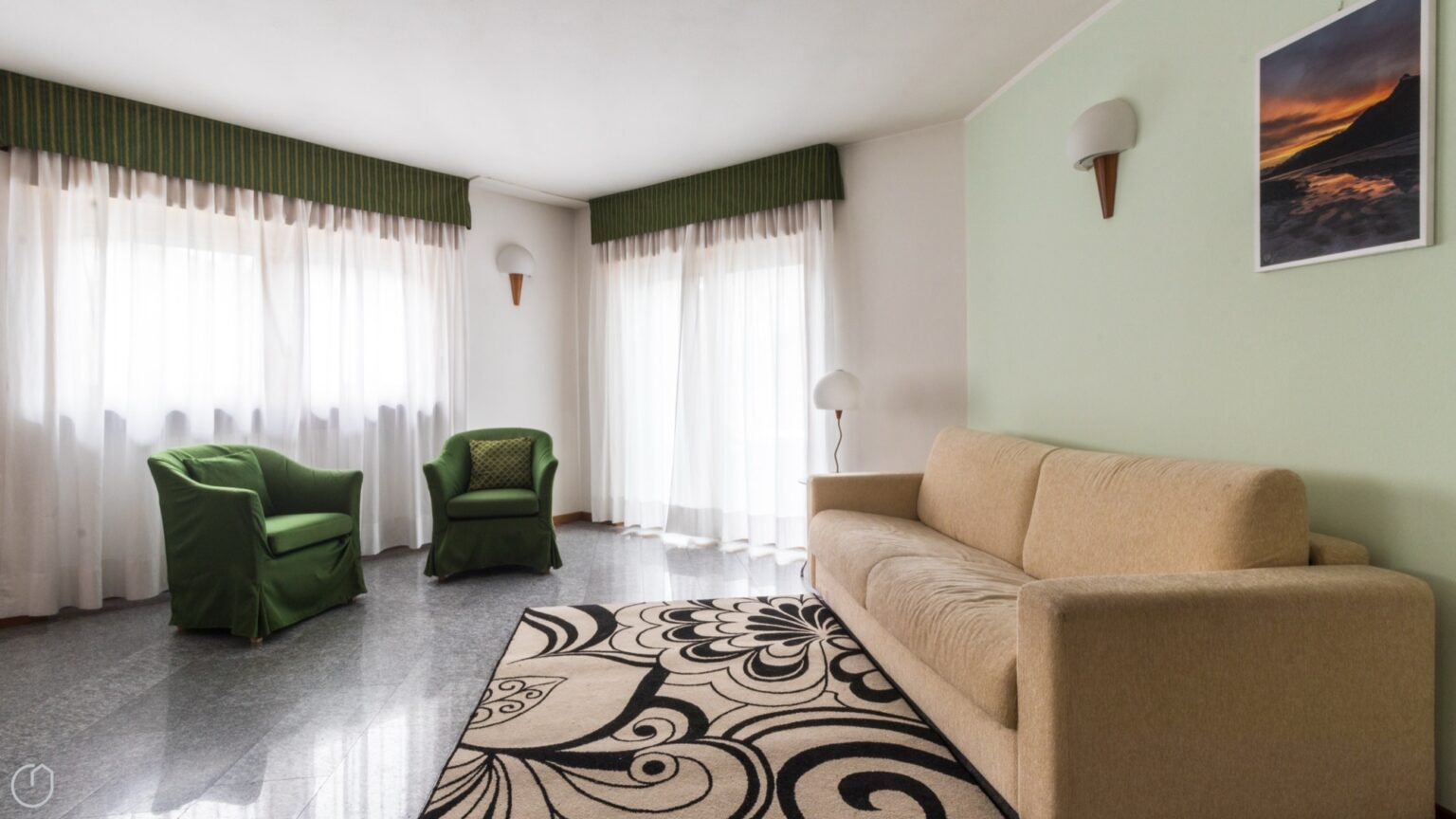 appartamento bilocale comfort in Valmalenco - soggiorno con poltrone e divano