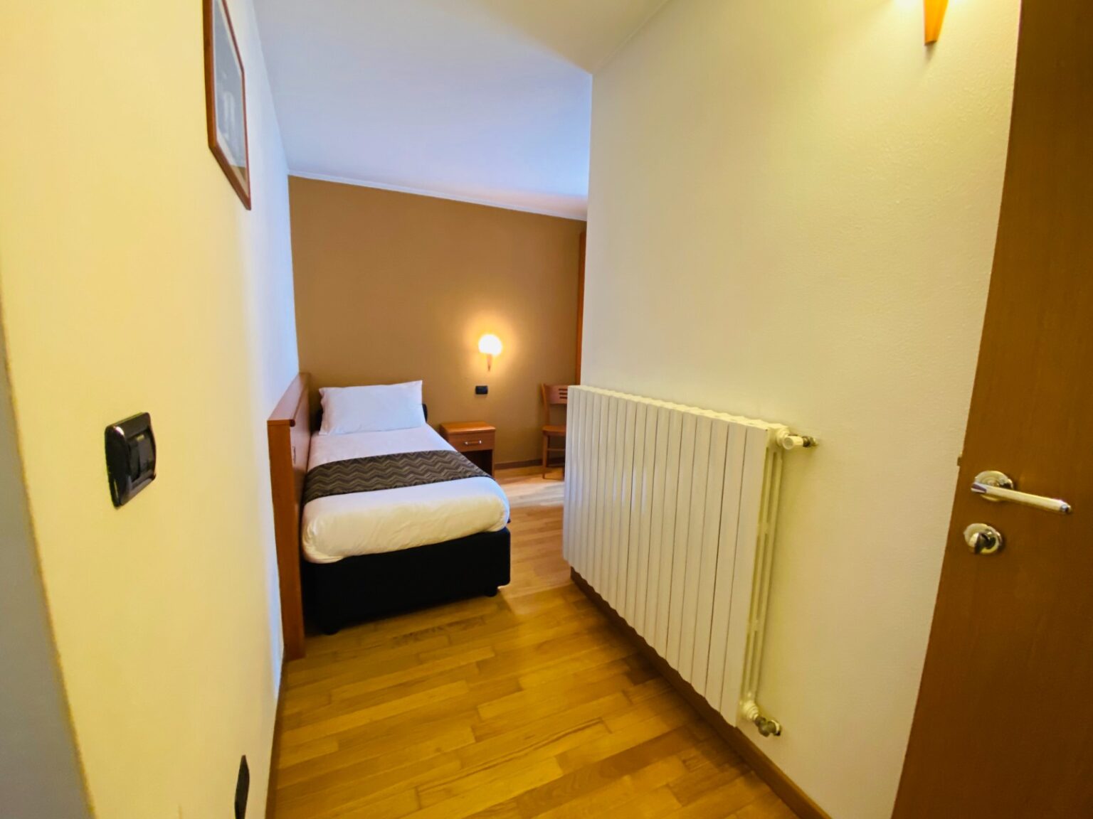 letto singolo in trilocale in affitto