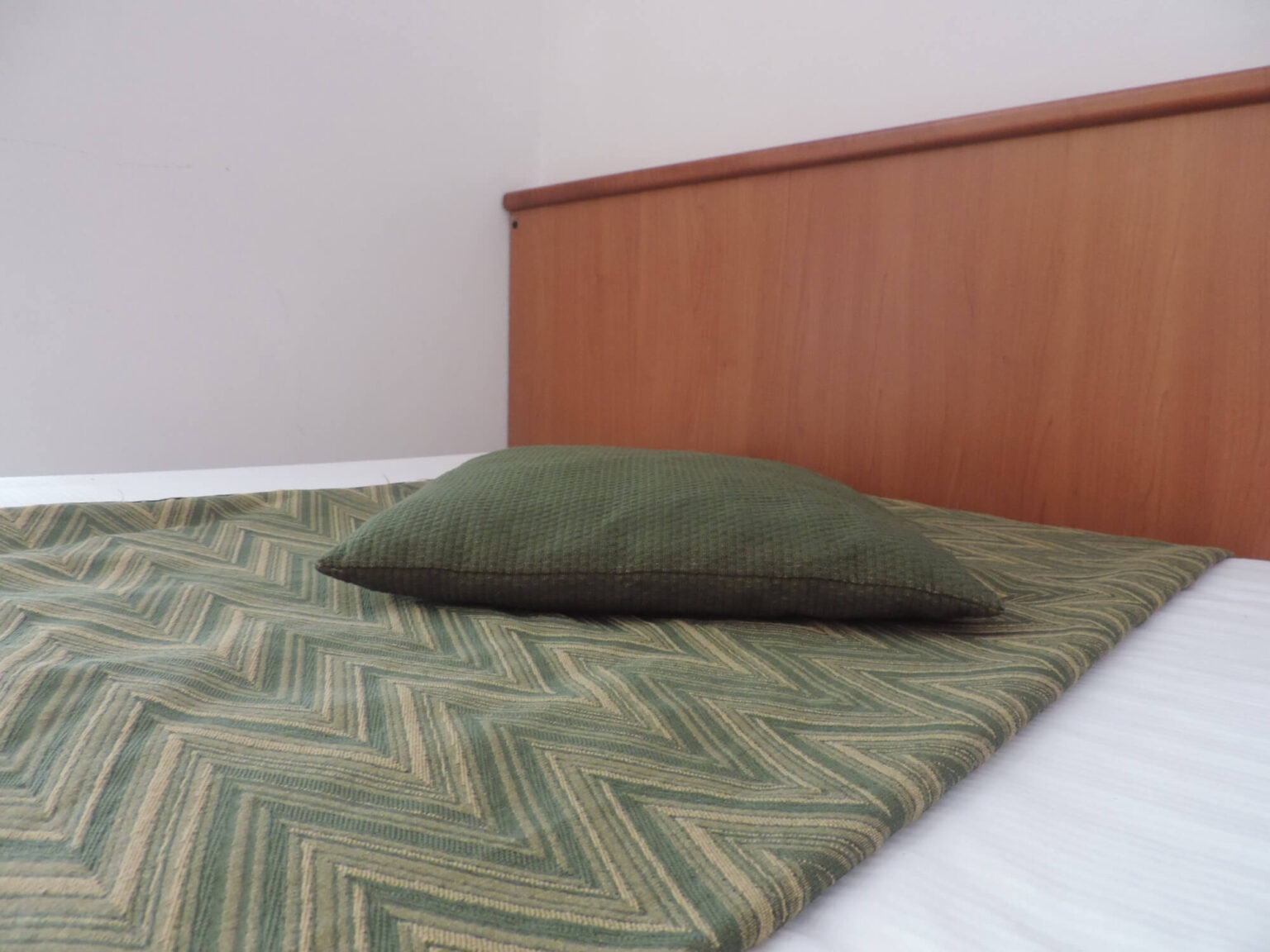 dettaglio letto singolo in monolocale in affitto in Valmalenco